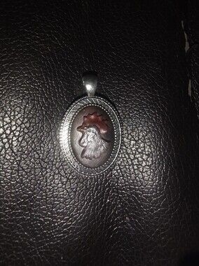 Resin Rooster Pendant On Silver Tone Bezel Frame.